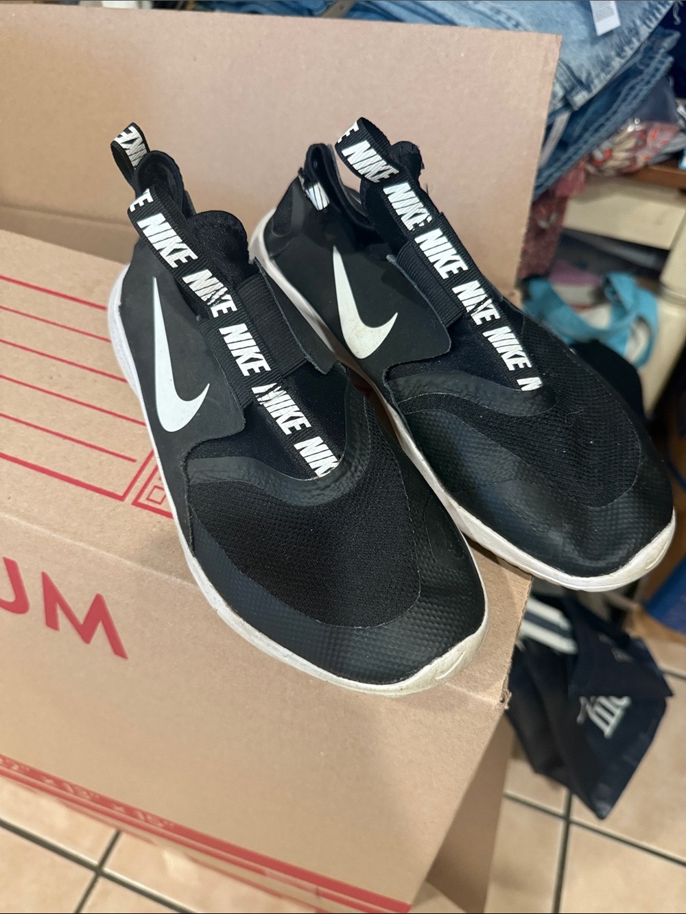 Nike Kids Black and White Slip-On Sneakers